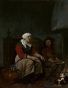 A woman and a boy cooking pancakes