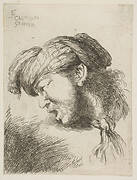 Man wearing a turban, a tie fastened around his neck, facing left,  from the series of  'Small Heads in Oriental Headdress'